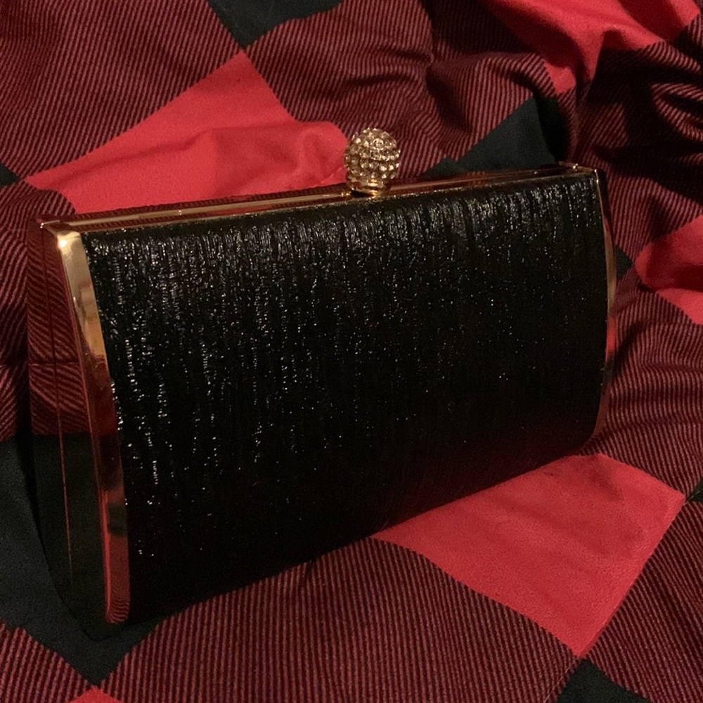 Rose gold and black clutch purse